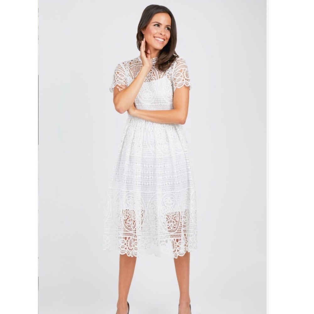 Olivia Culpo white lace dress